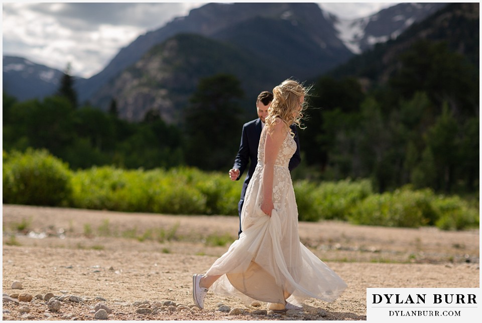 della terra mountain chateau wedding colorado rocky mountain national park wedding rmnp elopement bride circling her husband
