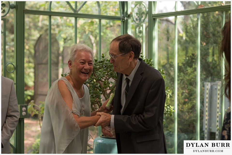 denver botanic gardens wedding colorado woodland mosaic bride grooms parent congratulating each other