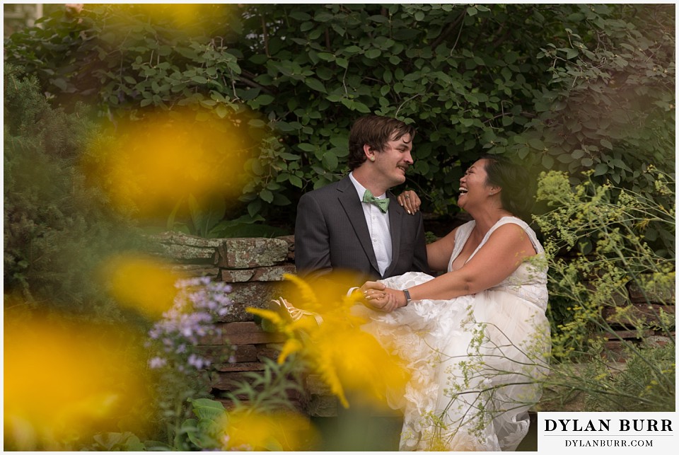 denver botanic gardens wedding colorado woodland mosaic bride sitting on grooms lap