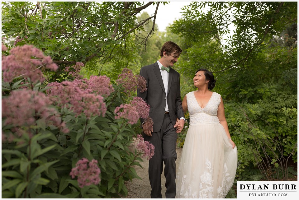 denver botanic gardens wedding colorado woodland mosaic bride groom walking together in park