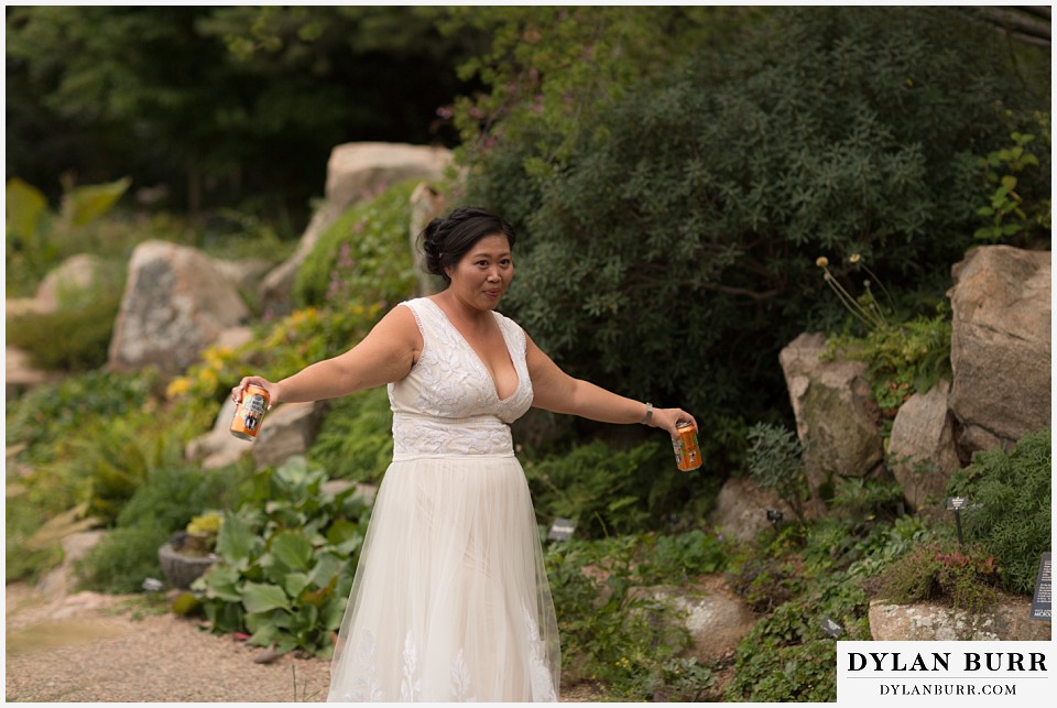 denver botanic gardens wedding colorado woodland mosaic bride bringing beers to groom