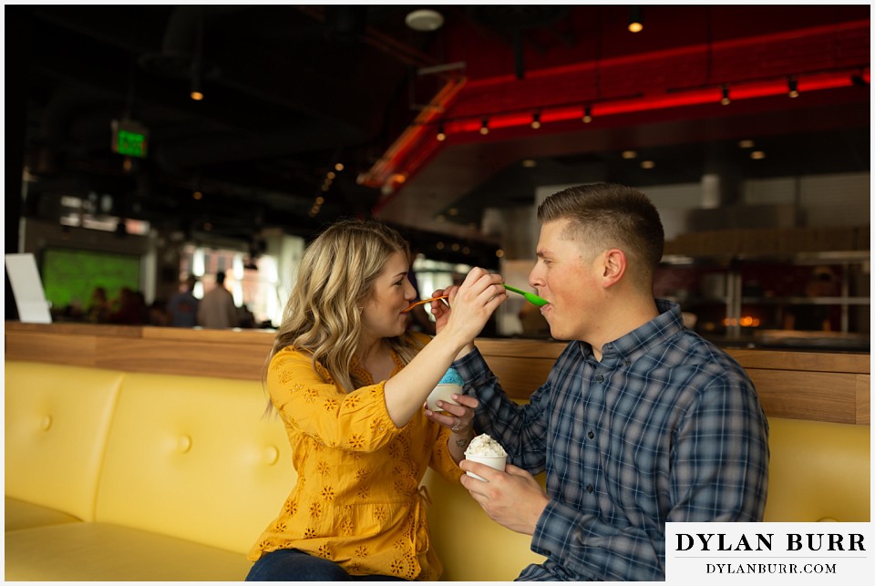 denver engagement photos dairy block downtown denver sharing each others ice cream flavors