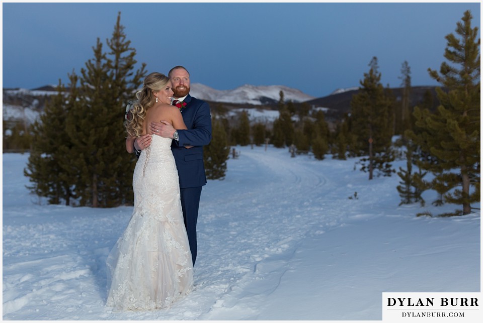 devils thumb ranch wedding in winter couple high mountain views in snow