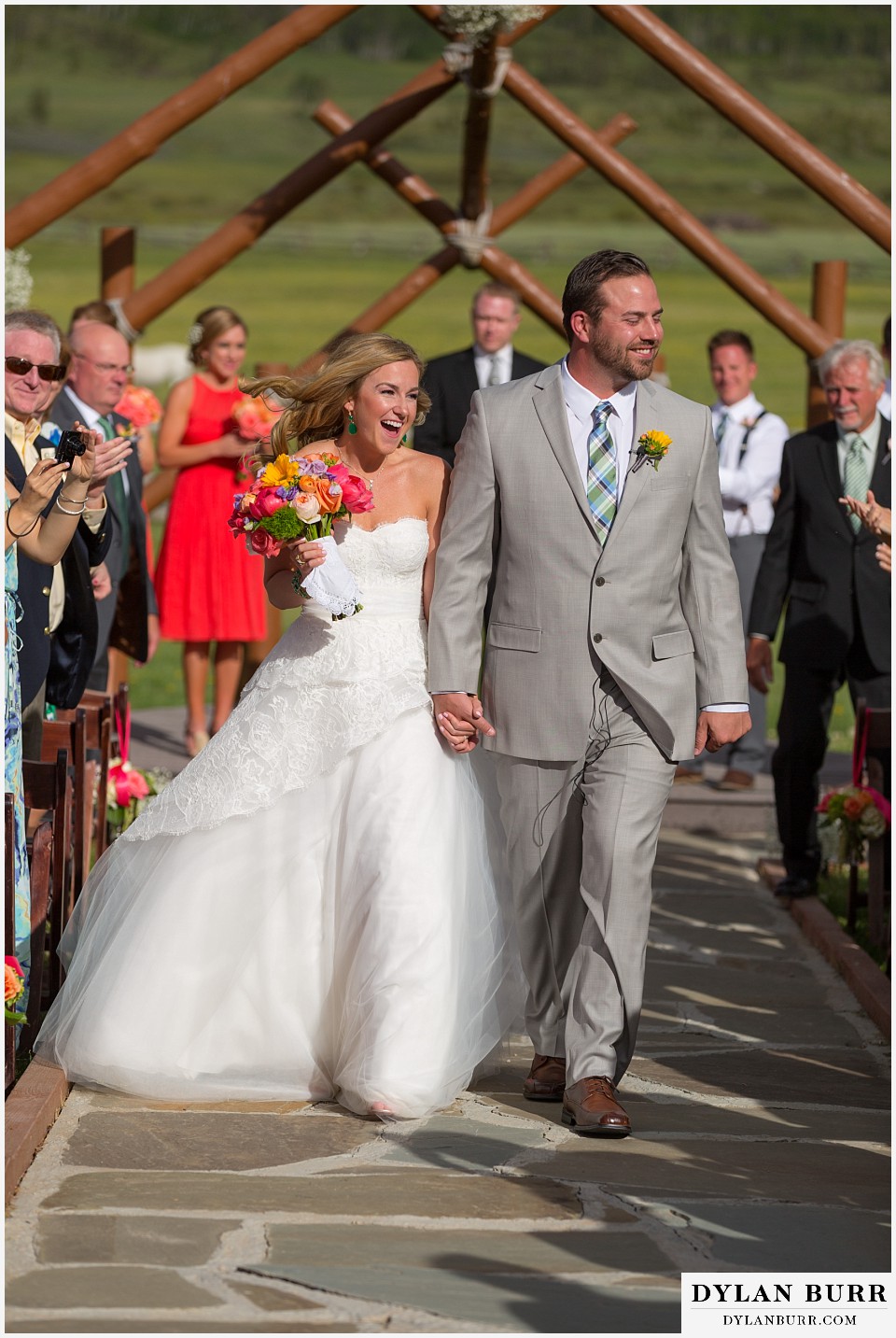 devils thumb ranch wedding bride and groom exiting wedding ceremony together