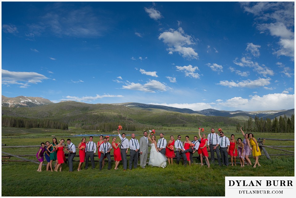 devils thumb ranch wedding entire bridal party having fun with bride and groom