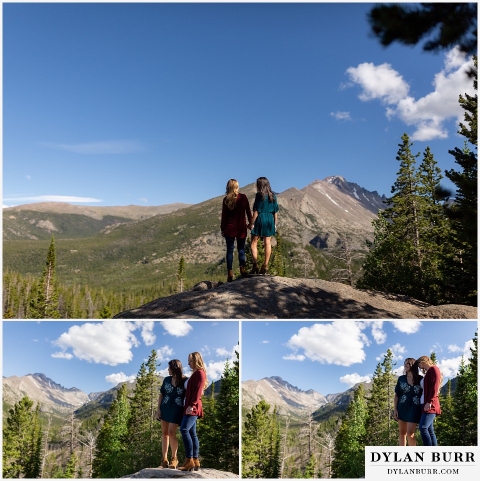 estes park engagement photos couple holding hands on top with wide mountain view