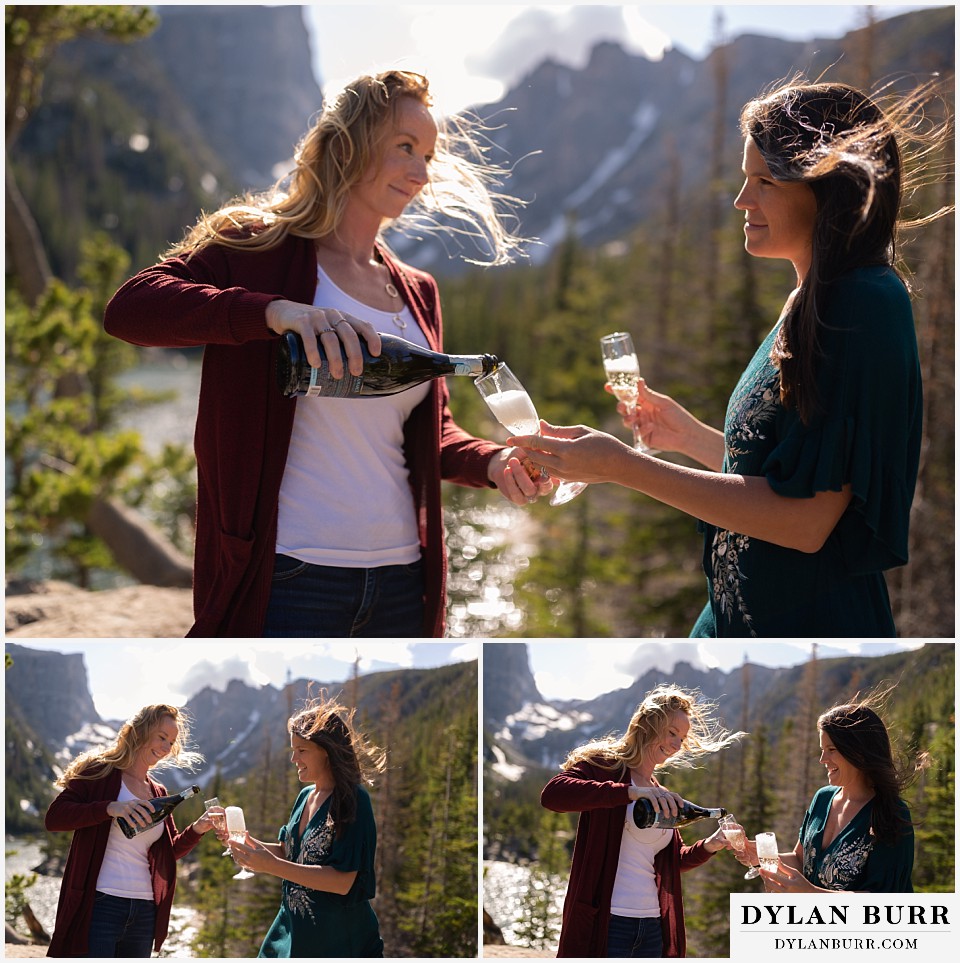 estes park engagement photos couple puring out champagne