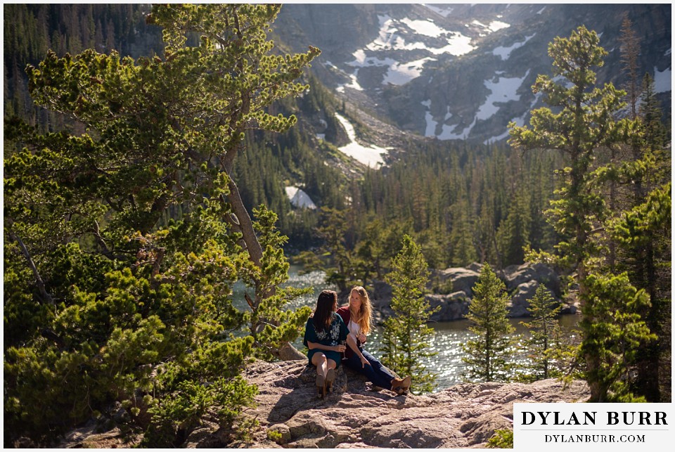 estes park engagement photos couple taking a minute and enjoying a glass of champagne