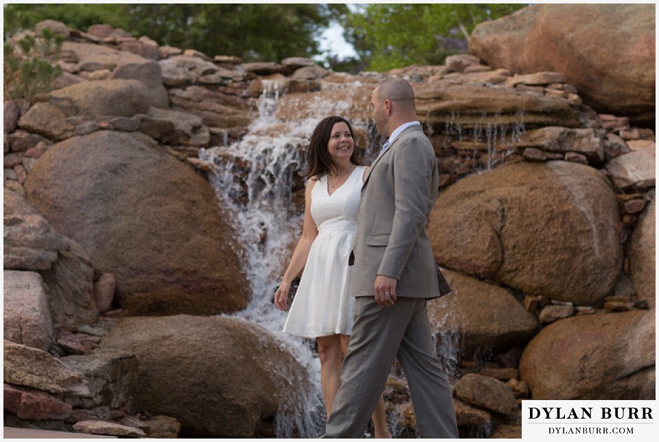 rocky mountain estes park engagement session Stanley Hotel waterfall