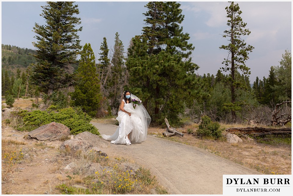 intimate wedding elopement sprague lake rocky mountain national park bride walking up to groom