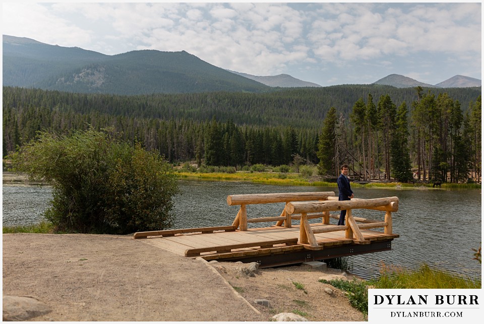 intimate wedding elopement sprague lake rocky mountain national park groom sees bride for the first time