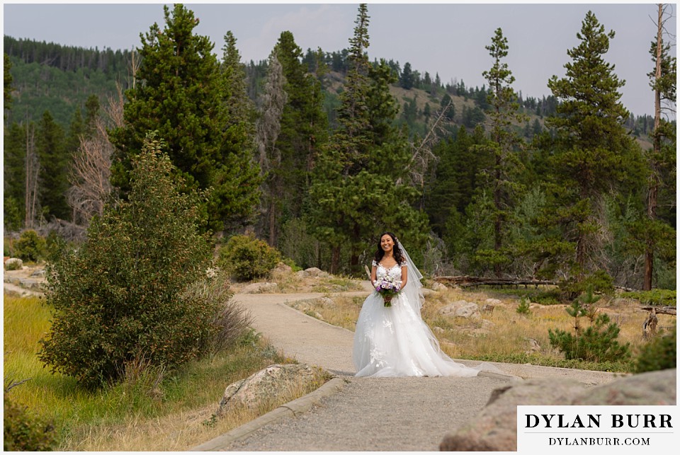intimate wedding elopement sprague lake rocky mountain national park happy bride walking up to groom