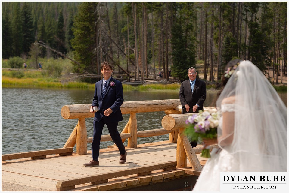 intimate wedding elopement sprague lake rocky mountain national park groom going to meet bride
