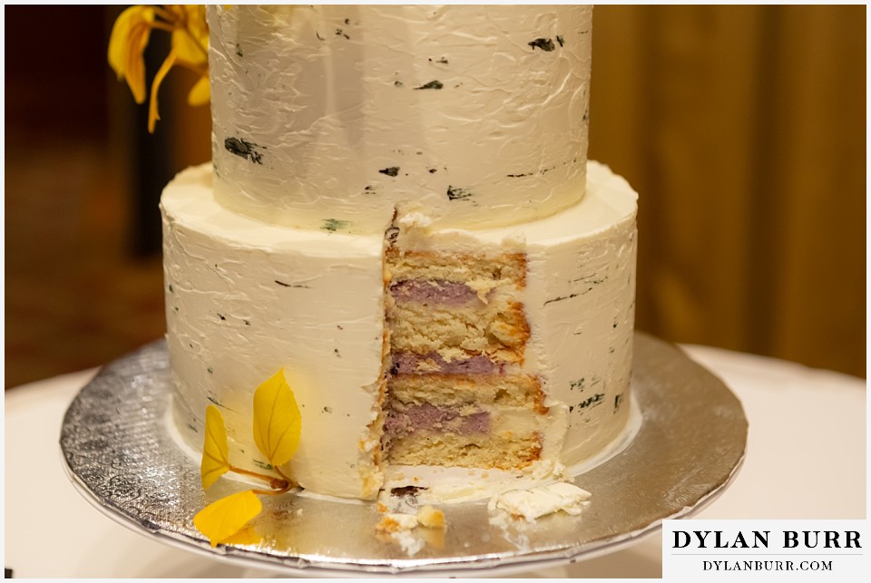 jackson lake lodge wedding grand tetons wyoming close up of wedding cake with huckleberry frosting