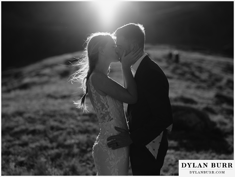 sunrise elopement wedding black and white of the first kiss