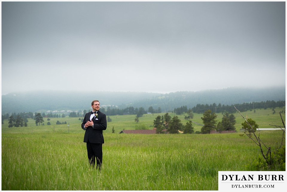 lookout mountain wedding groom alone in a field