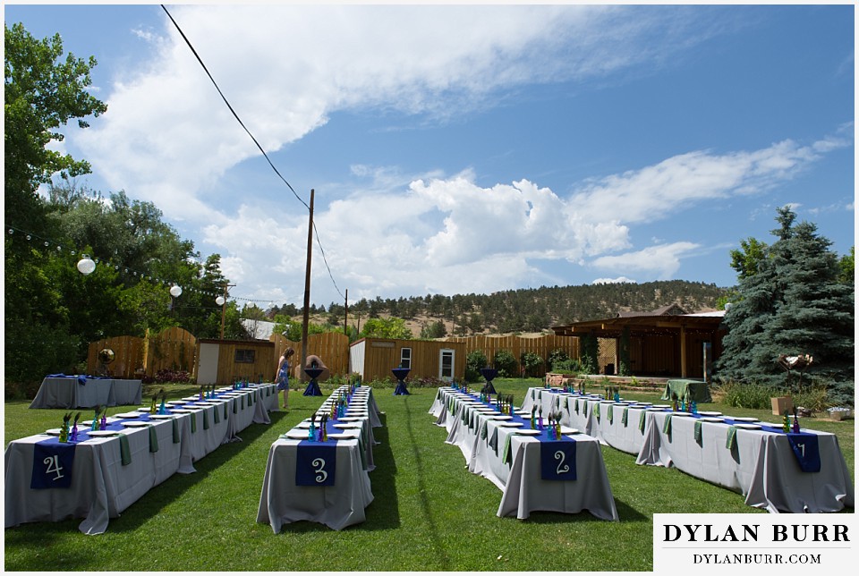 lyons farmette wedding long reception tables on lawn