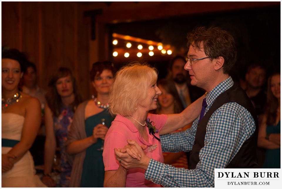 lyons farmette wedding groom dancing with mom