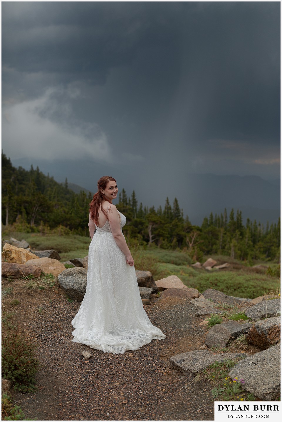 mount blue sky elopement wedding bride with crazy weather
