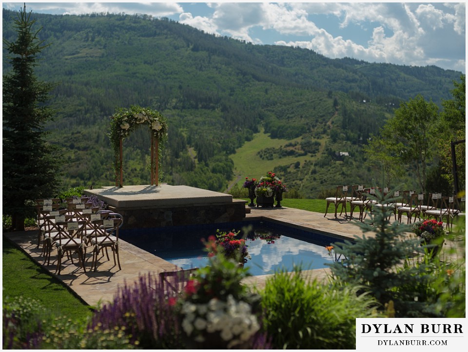 personal mountain home colorado wedding ceremony altar near pool with a mountain view