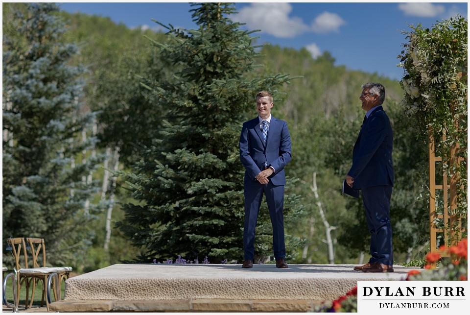 personal mountain home colorado wedding excited groom waiting for bride