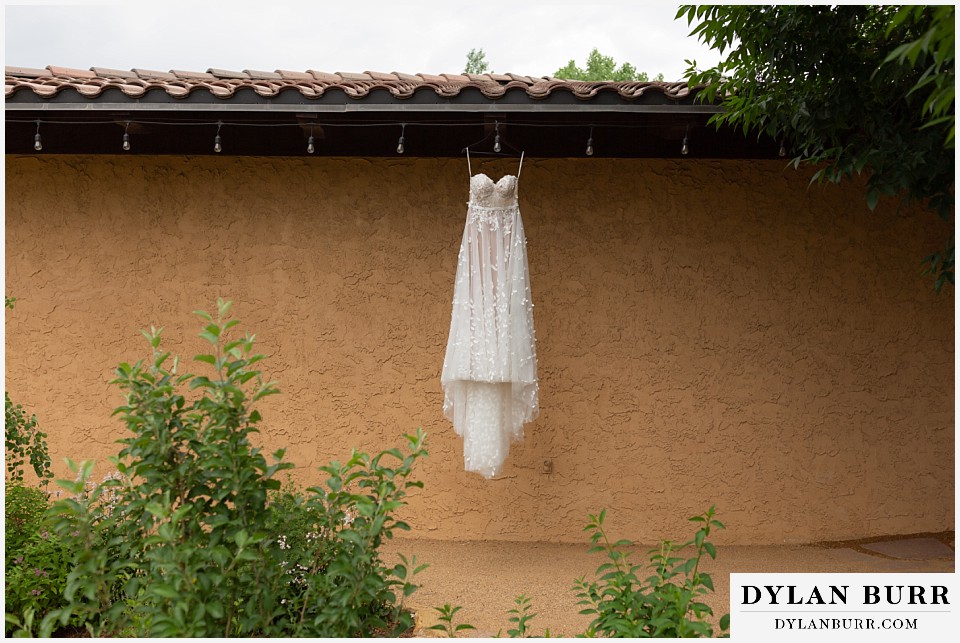 villa parker wedding dress hanging up