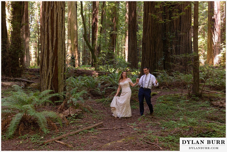 redwood forest wedding elopement avenue of the giants california bride and groom dancing in forest