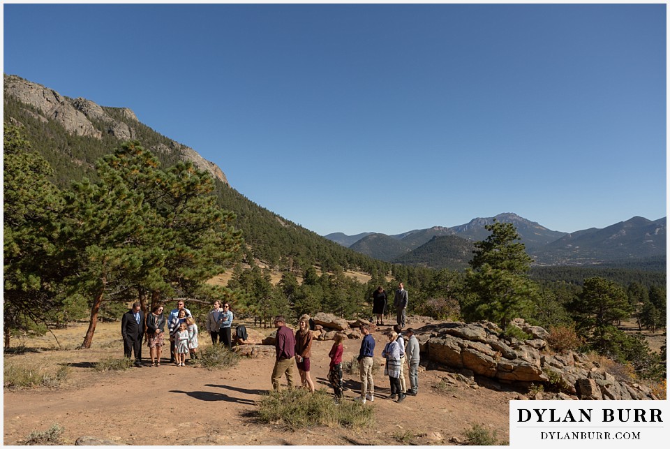 rocky mountain national park elopement wedding family and groom awaiting the bride