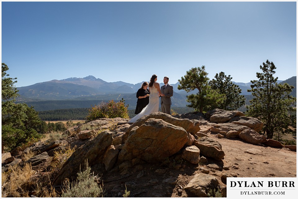 rocky mountain national park elopement wedding groom looking on at bride