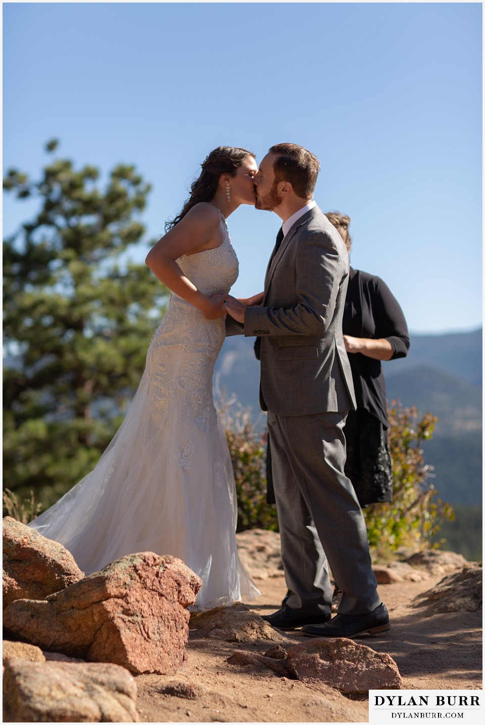 rocky mountain national park elopement wedding bride and groom first kiss