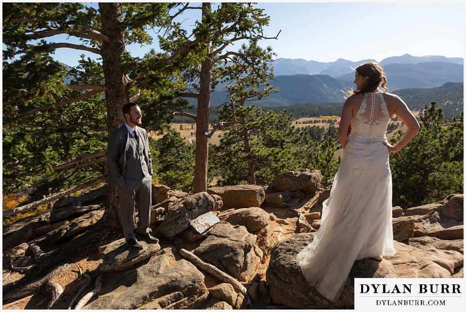 rocky mountain national park elopement wedding groom looks on at his wife