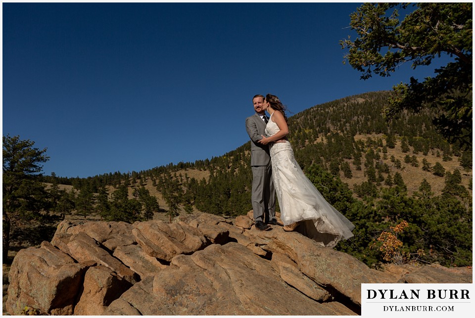 rocky mountain national park elopement wedding bride and groom on a mountain top