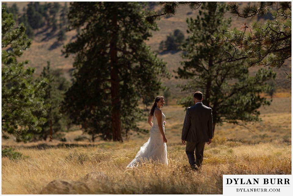 rocky mountain national park elopement wedding groom meets up with bride