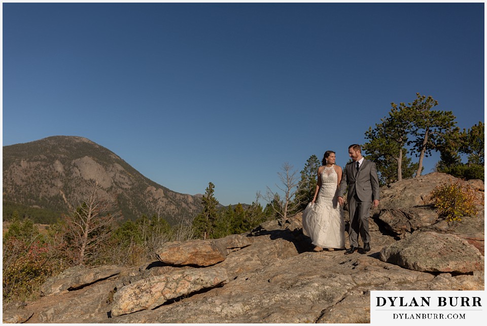 rocky mountain national park elopement wedding bride and groom on rocks