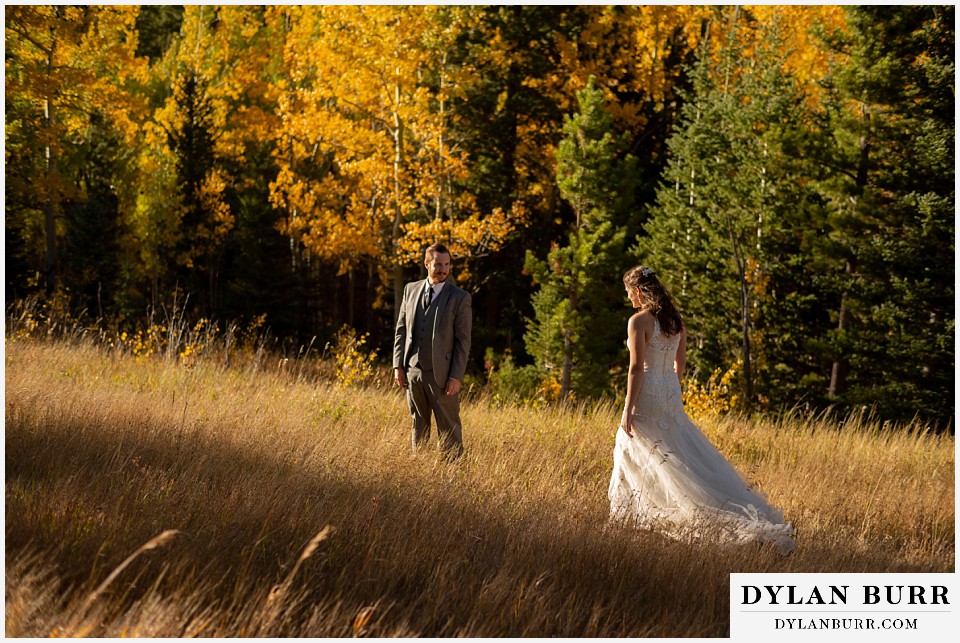rocky mountain national park elopement wedding walking in the mountains in fall