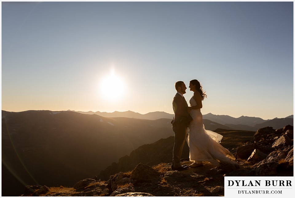 rocky mountain national park elopement wedding couple in sunlit silhouette