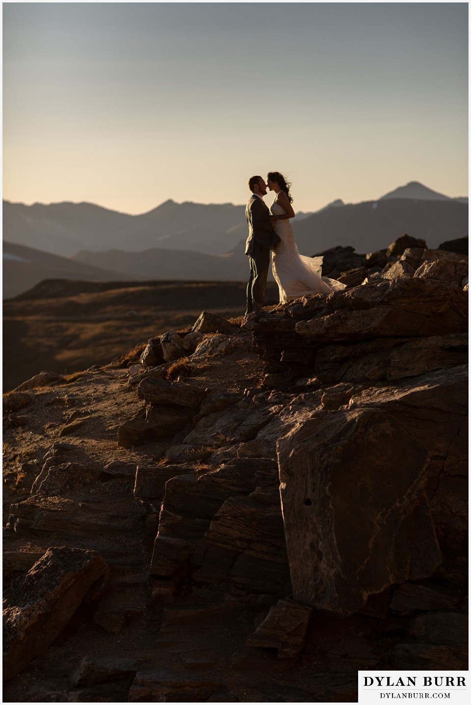 rocky mountain national park elopement wedding couple on rocky mountain top