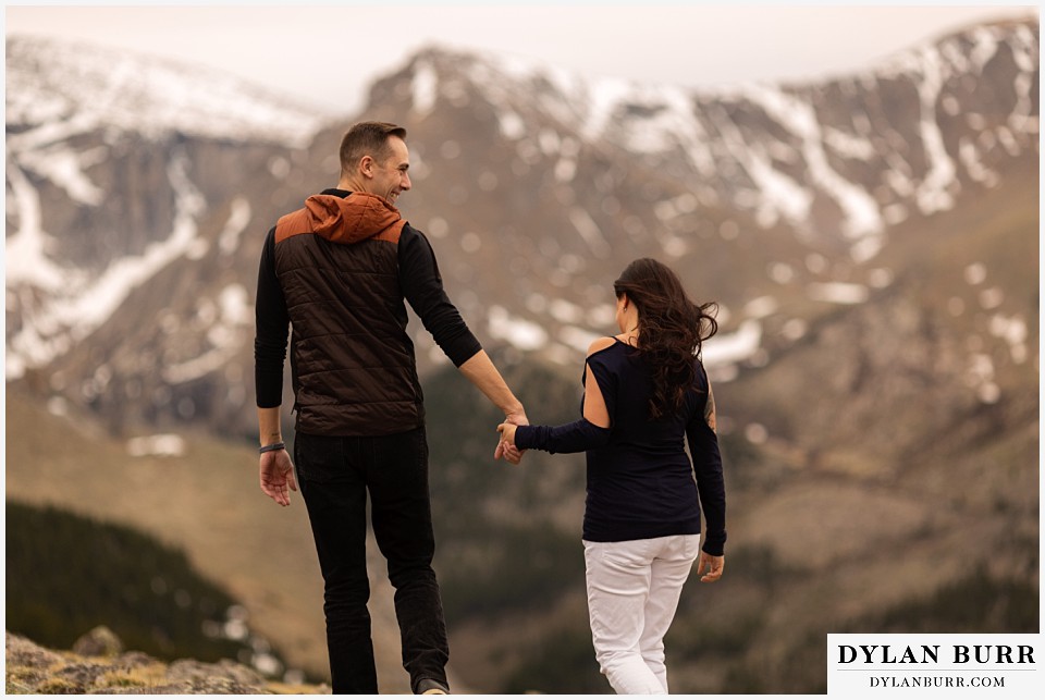 rocky mountain engagement session in colorado huge snow capped mountains