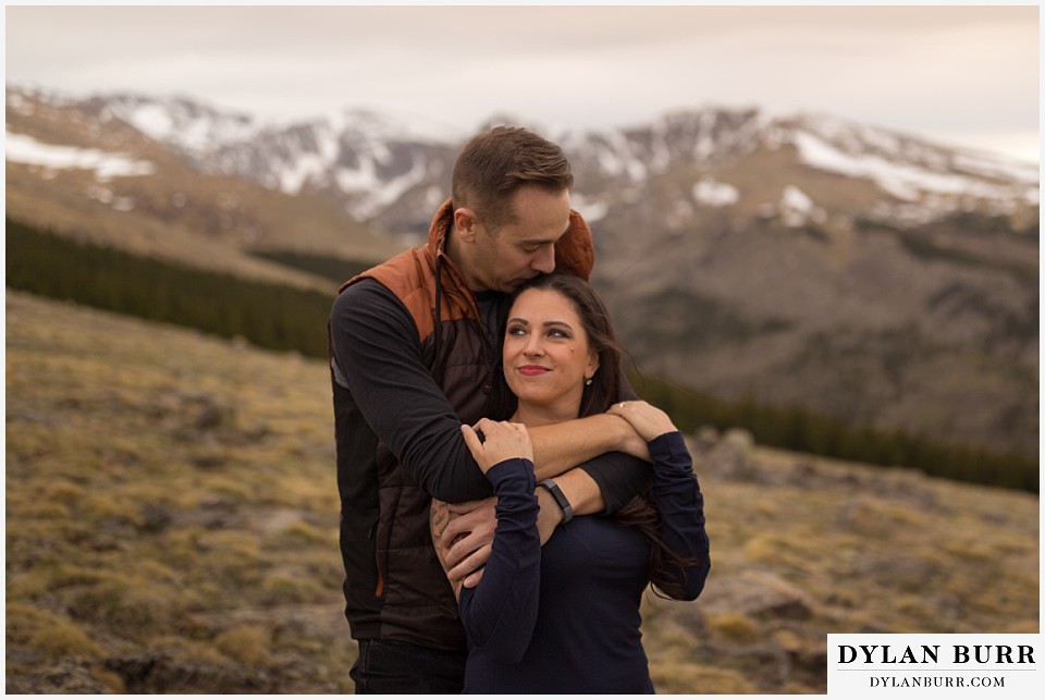rocky mountain engagement session in colorado high mountain hugs