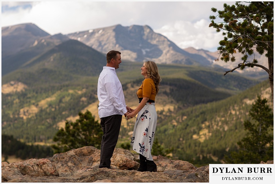 rocky mountain national park elopement wedding bride and groom holding hands