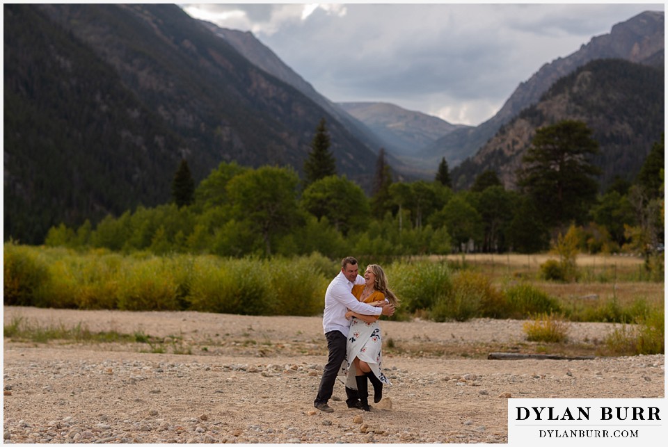 rocky mountain national park elopement wedding groom brings bride in close