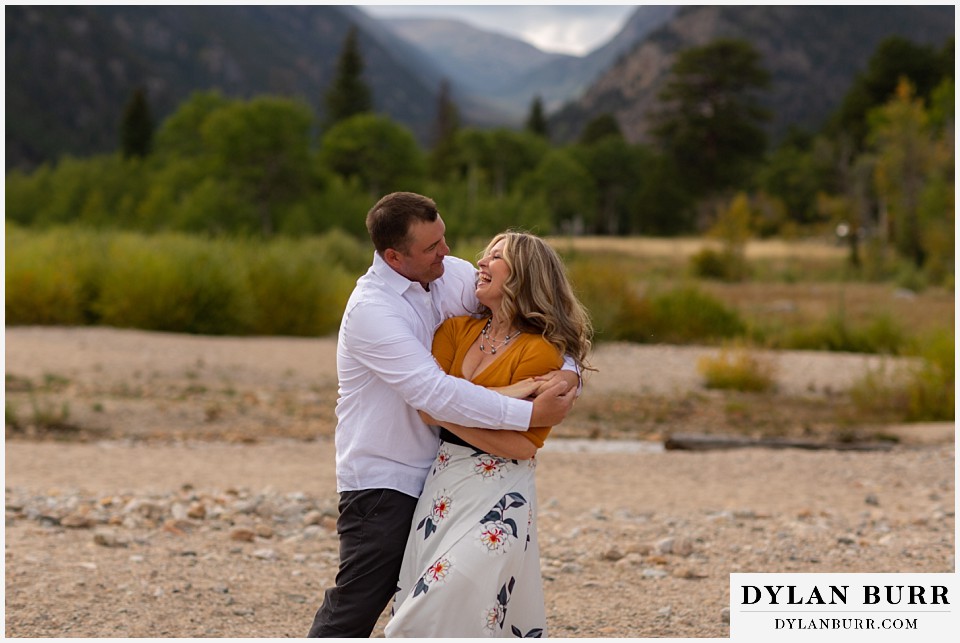 rocky mountain national park elopement wedding he bear hugs his wife