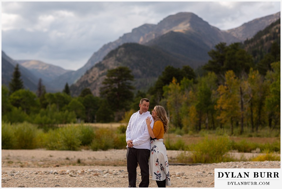 rocky mountain national park elopement wedding bride and groom together near river