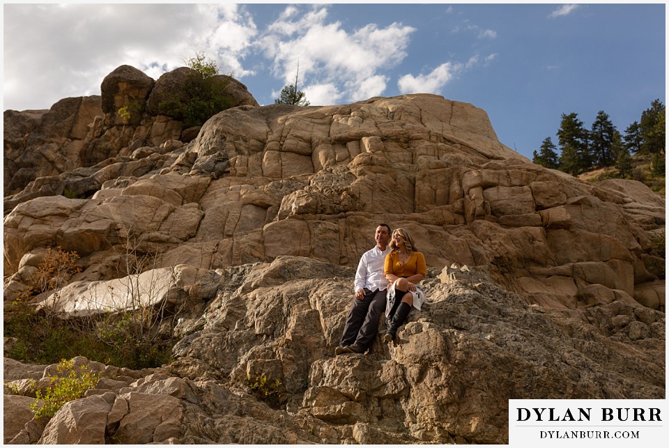 rocky mountain national park elopement wedding couple getting some sun on rocks