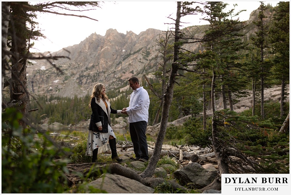 rocky mountain national park elopement wedding bride and groom hiking in high mountains