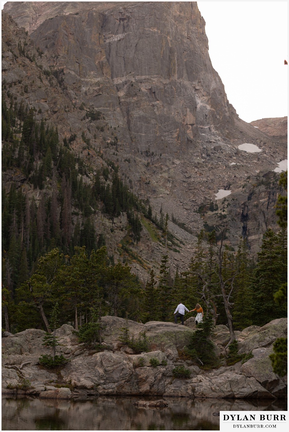 rocky mountain national park elopement wedding couple hiking with huge mountain views