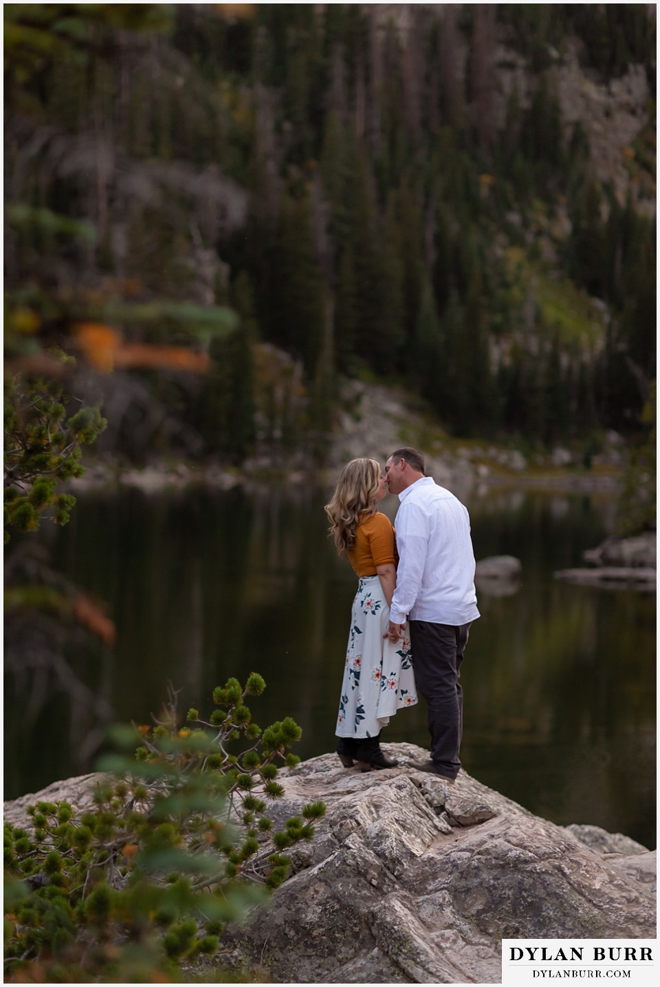rocky mountain national park elopement wedding husband kissing his wife