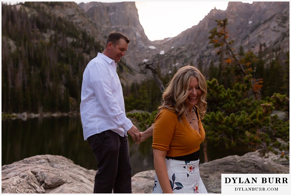rocky mountain national park elopement wedding bride and groom hiking down