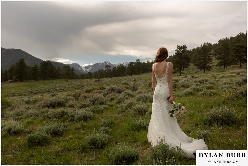 rocky mountain national park elopement wedding rmnp behind bride with lacy dress in mountains