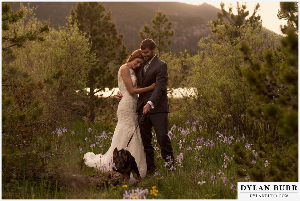 rocky mountain national park elopement wedding rmnp newlyweds holding eachother